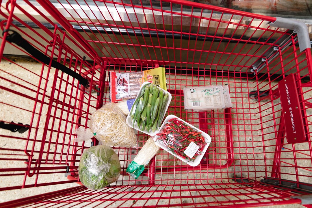 (Rachel Rydalch | The Salt Lake Tribune) A customers cart with a variety of vegetables at the Chinatown Supermarket on Wednesday, March 2, 2022.