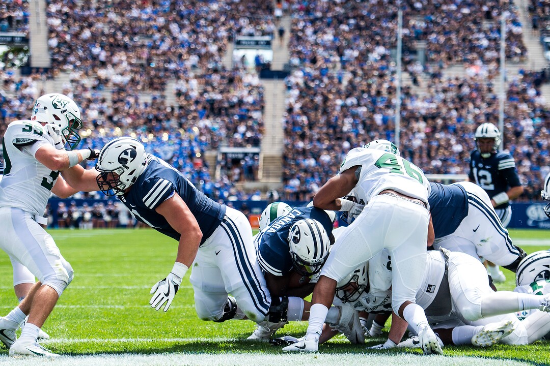 (Chris Detrick  |  The Salt Lake Tribune) Brigham Young Cougars running back Squally Canada (22) scores a touchdown during the game at LaVell Edwards Stadium Saturday, August 26, 2017.