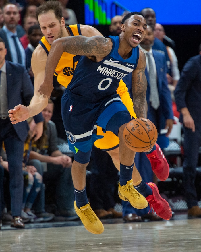 (Rick Egan  |  The Salt Lake Tribune)     Utah Jazz forward Bojan Bogdanovic (44) fouls Minnesota Timberwolves guard Jeff Teague (0), in NBA action between the Utah Jazz and the Minnesota Timberwolves in Salt Lake City, Monday, Nov. 18, 2019.