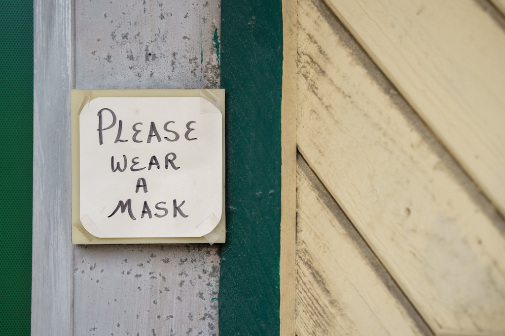 (Trent Nelson  |  Tribune file photo) A sign requests the wearing of masks, in Murray on Friday, Jan. 29, 2021.