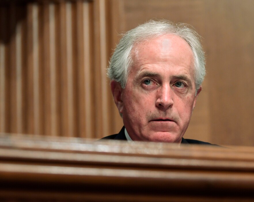 In this Dec. 5, 2017 file photo, Sen. Bob Corker, R-Tenn., listens during a meeting of the Senate Banking Committee on Capitol Hill in Washington. The Senate Finance Committee chairman on Monday rejected as "categorically false" a report that Republican Sen. Bob Corker of Tennessee was responsible for a provision in the final tax bill that could help him financially.   (AP Photo/Susan Walsh)