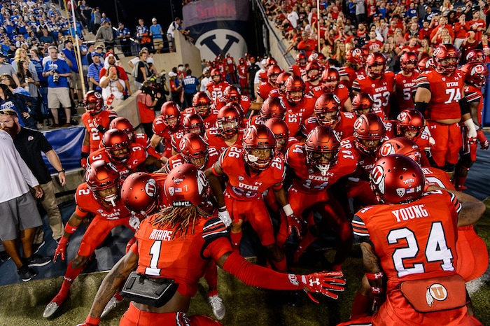 (Trent Nelson | The Salt Lake Tribune)  Utah takes the field as BYU hosts Utah on Saturday, September 9, 2017.