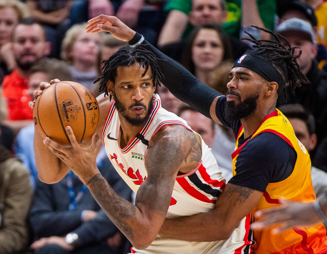 (Rick Egan  |  The Salt Lake Tribune)     Utah Jazz guard Mike Conley (10) guards Portland Trail Blazers forward Trevor Ariza (8), in NBA action between the Utah Jazz and thePortland Trail Blazers in Salt Lake City, Friday, Feb. 7, 2020.