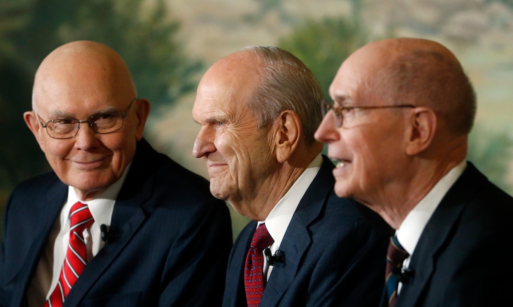 FILE - In this Jan. 16, 2018, file photo, shows President Russell M. Nelson, center, as his counselors Dallin H. Oaks, left and Henry B. Eyring, speaking during a news conference, in Salt Lake City. The Mormon church, announced Monday, March 26, 2018,  is making significant changes to its guidelines for how local leaders are supposed to handle reports of sexual abuse and one-on-one meetings with youth amid heightened scrutiny over sexual abuse from the #MeToo  movement and one week after a former prominent church missionary leader was accused of sexually assaulting two women in the 1980s. (AP Photo/Rick Bowmer, File)