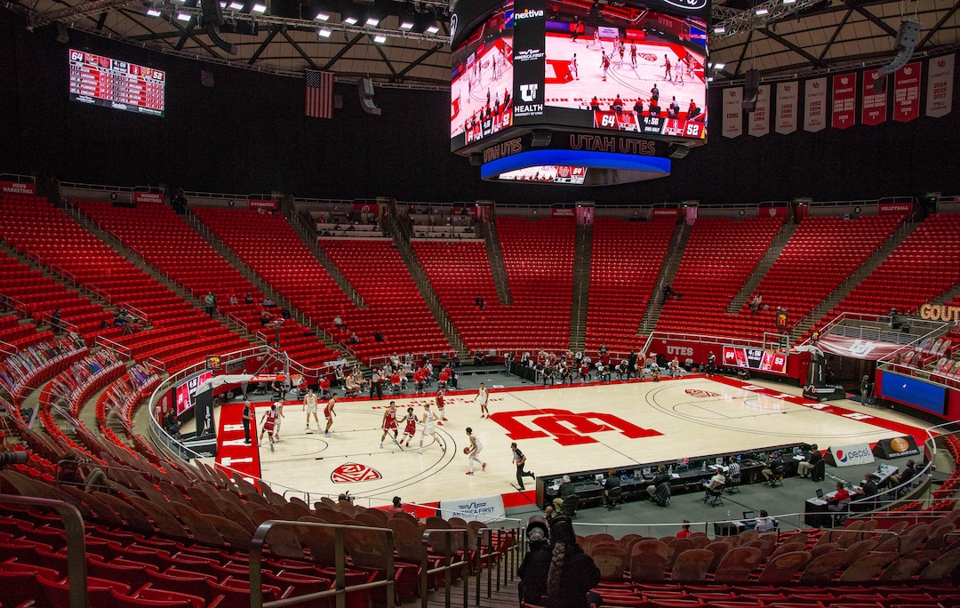 (Francisco Kjolseth  | The Salt Lake Tribune) Photographs and piped in sounds of a crowd fill the void as the Utes host the Stanford Cardinal on Thursday, Jan. 14, 2021 at the Jon M. Huntsman Center in Salt Lake City.