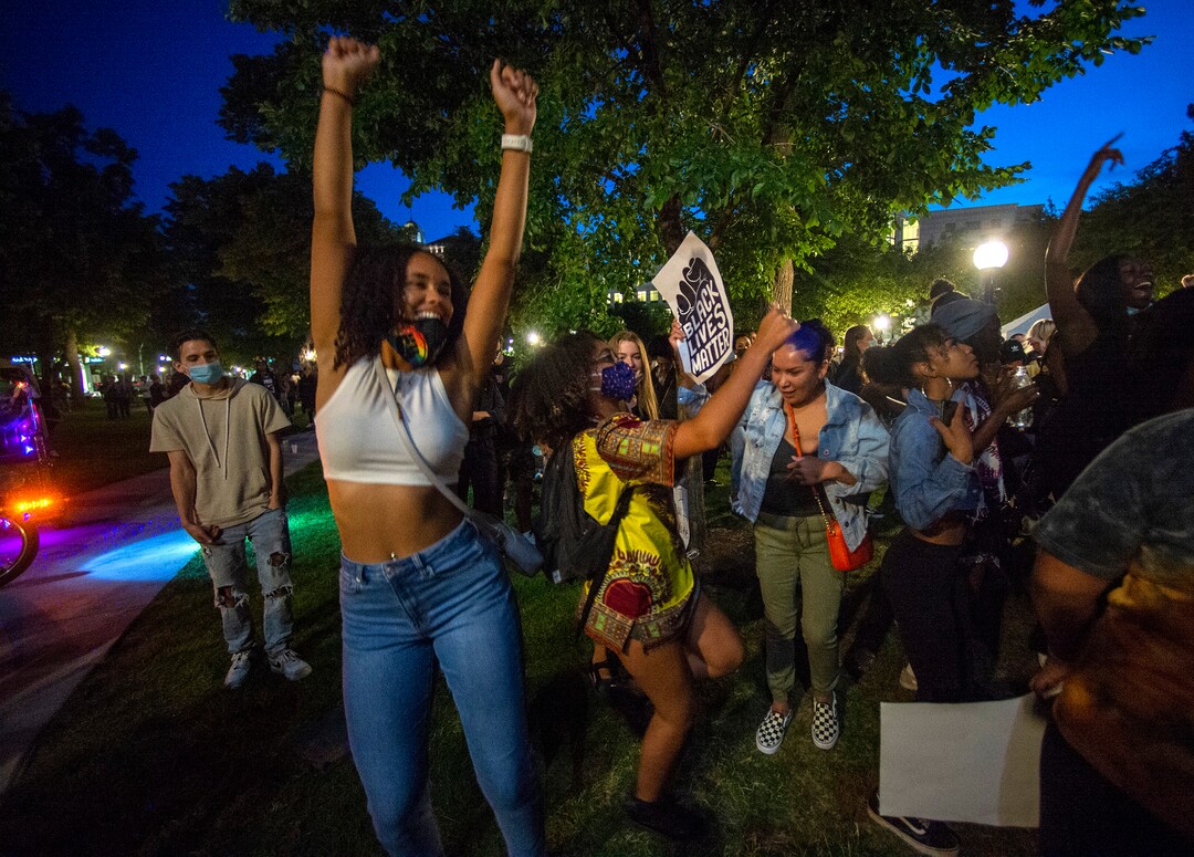 (Rick Egan  |  The Salt Lake Tribune)  Revelers dance to the music as the Juneteenth celebration continued into the evening at Washington Square, in Salt Lake City on Friday, June 19, 2020.