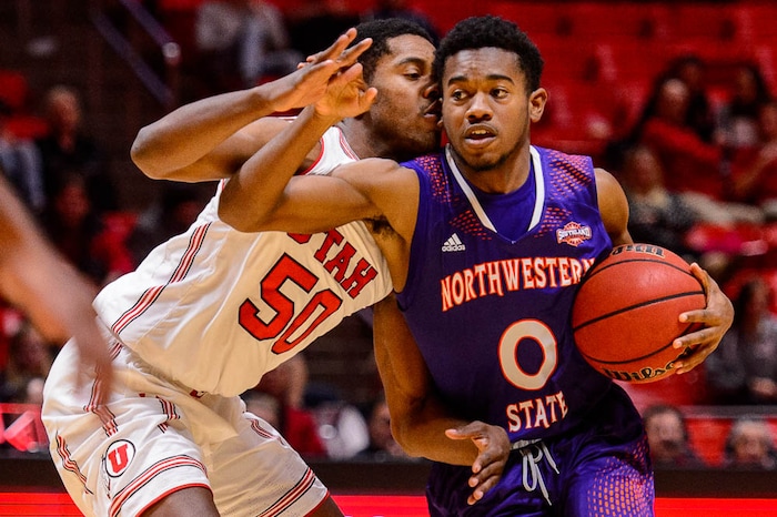 (Trent Nelson | The Salt Lake Tribune)  Utah Utes guard Christian Popoola (50) defending Northwestern State Demons guard C.J. Jones (0) as the University of Utah hosts Northwestern State, NCAA basketball in Salt Lake City, Wednesday December 20, 2017.