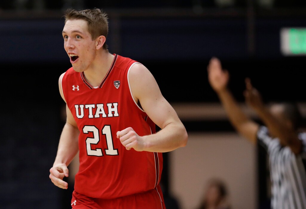 Utah forward Tyler Rawson (21) reacts after making a 3-point basket against Saint Mary's during the second half of an NCAA college basketball game in the quarterfinals of the NIT, Wednesday, March 21, 2018, in Moraga, Calif. (AP Photo/Marcio Jose Sanchez)