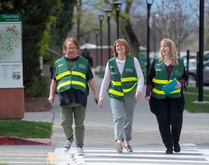 (Rick Egan | The Salt Lake Tribune) Emergency response captains, Terry Merritt, Karen Zundel, and Laurie Bagley make their way to the emergency assembly point in Presidents Circle on the University of Utah campus, during the Great Utah ShakeOut Annual Statewide Earthquake Drill Thursday, April 19, 2018.