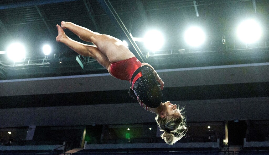 (Leah Hogsten | The Salt Lake Tribune) Lucy Stanhope performs on vault during the fourth-annual Rio Tinto Best of Utah gymnastics meet between Brigham Young University, Southern Utah University, Utah State University and the University of Utah at the Maverik Center, Jan. 13, 2023. Stanhope received a 9.900.