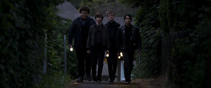 (JP Bernier  |  courtesy Sundance Institute) Davey (Graham Verchere, middle left) suspects a neighbor of being a killer, so he enlists his friends (from left: Caleb Emery, Cory Grüter-Andrew and Judah Lewis) to investigate, in "Summer of '84," by directors Francois Simard, Anouk Whissell and Yoann Whissell. The movie will screen in the Midnight section of the 2018 Sundance Film Festival.