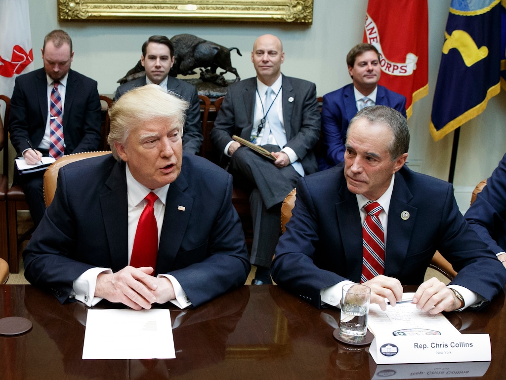 (Evan Vucci  |  Associated Press file photo) In this Feb. 16, 2017, photo, Republican U.S. Rep. Chris Collins of western New York state, right, sits next to President Donald Trump during a meeting with House Republicans in the Roosevelt Room of the White House in Washington. Collins was indicted on charges that he used inside information about a biotechnology company to make illicit stock trades. Collins' son and a family acquaintance were also charged.