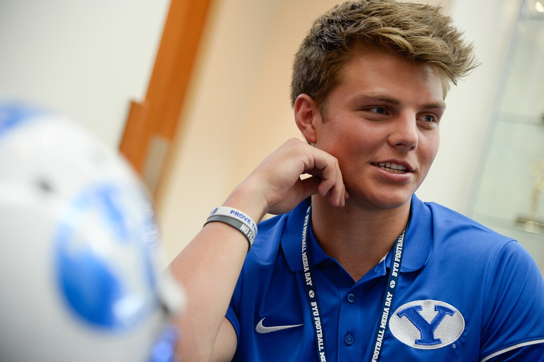 (Francisco Kjolseth  |  The Salt Lake Tribune)  Quarterback Zach Wilson runs through numerous interviews during BYU football media day at the BYU Broadcasting Building in Provo on Tuesday, June 18, 2019.