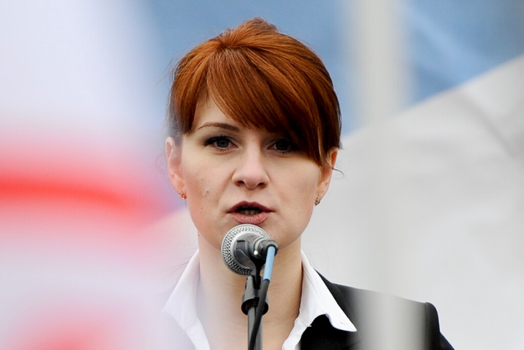 (The Associated Press) In this April 21, 2013 file photo, Maria Butina, leader of a pro-gun organization in Russia, speaks to a crowd during a rally in support of legalizing the possession of handguns in Moscow, Russia. Prosecutors say they have “resolved” a case against Butina accused of being a secret agent for the Russian government, a sign that she likely has taken a plea deal. The information was included in a court filing Monday.