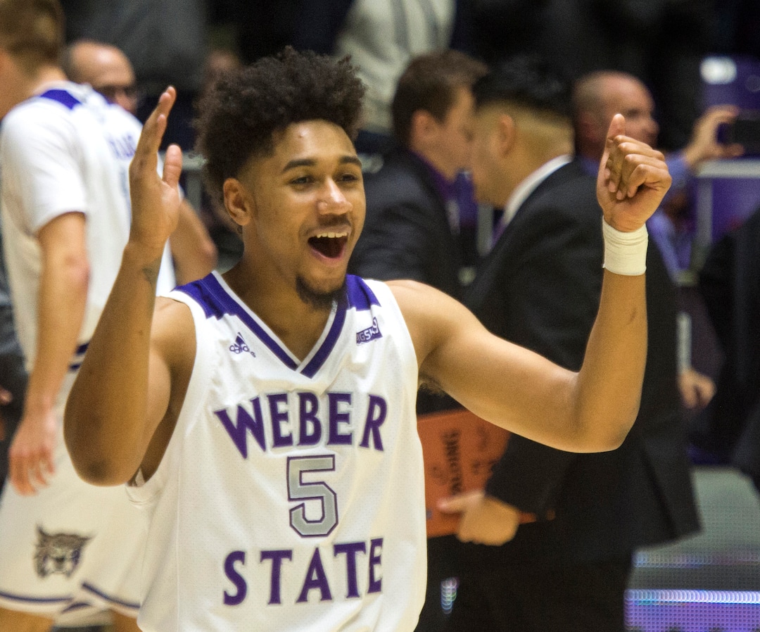 (Rick Egan  |  The Salt Lake Tribune)       Weber State Wildcats guard Cody John (5) celebrates Weber State's win over BYU, in basketball action between Brigham Young Cougars and Weber State Wildcats, at the Dee Event Center in Ogden, Saturday, Dec. 1, 2018.