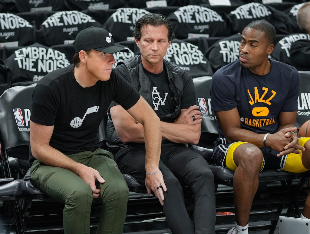 (Leah Hogsten | Tribune file photo)  Utah Jazz assistant coach Bryan Bailey, right, shown alongside then-head coach Quin Snyder and team owner Ryan Smith in April 2022, is rumored to be a candidate to join Snyder's new staff with the Atlanta Hawks.