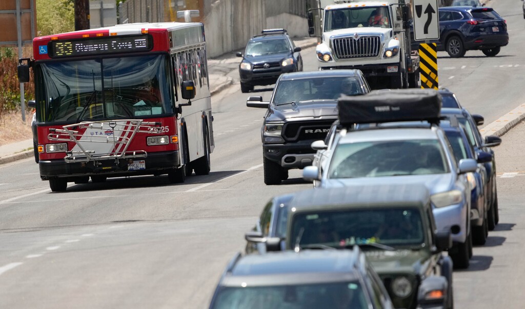 (Francisco Kjolseth | The Salt Lake Tribune) A UTA bus travels the streets of Salt Lake City on Friday, June 21, 2024.