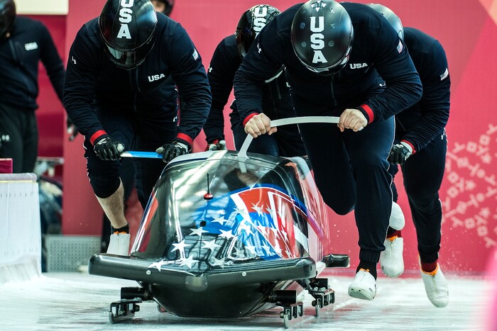 (Chris Detrick  |  The Salt Lake Tribune)  USA's Justin Olsen, Nathan Weber, Carlo Valdes and Chris Fogt push the sled at the start during the 4-man Official Training at Olympic Sliding Centre during the Pyeongchang 2018 Winter Olympics Wednesday, Feb. 21, 2018. 