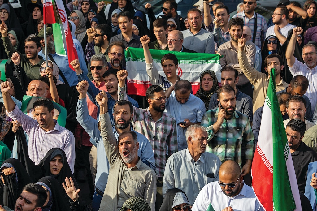 Iranians shout slogans during an anti-US and anti-Israel demonstration in Tehran, Iran, on June 22, 2025. (Arash Khamooshi/The New York Times)