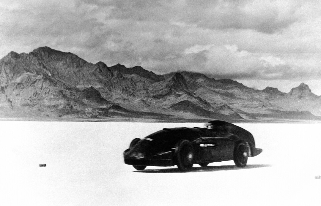 (AP file photo) Captain George Eyston drove his giant car Thunderbolt at 310 mph at Bonneville Salt Flats, Utah, a new record. Clutch trouble on the return run robbed him of an official highest speed. Captain Eyston in his Thunderbolt being shoved off at the commencement of a high speed run over Bonneville Salt Flats, Utah, on Nov. 6, 1937.