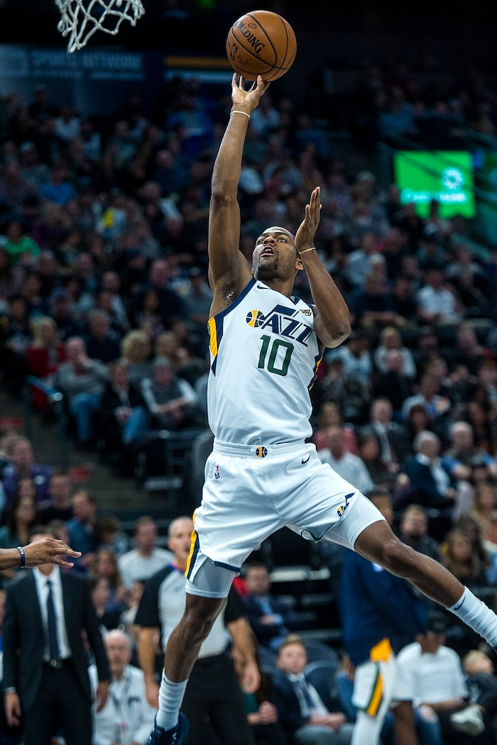 (Chris Detrick  |  The Salt Lake Tribune)  Utah Jazz guard Alec Burks (10) shoots during the game at Vivint Smart Home Arena Friday, December 1, 2017.  