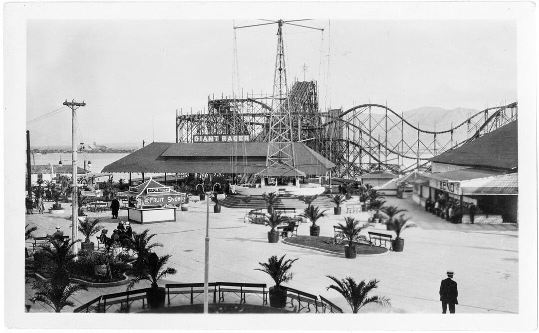 (Utah State Historical Society) Photograph of various rides, games, and food stands at the Saltair II resort.