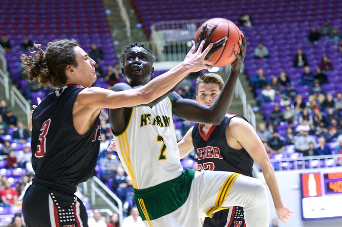 (Leah Hogsten  |  The Salt Lake Tribune) Kearns' David Andrew (03) is fouled by Weber's Hudson Schenck (03). Weber defeated Kearns 60-52 in the 6A High School Boys' Basketball Tournament opening game at Weber State University’s Dee Events Center in Ogden, Tuesday, Feb. 27, 2018. 
