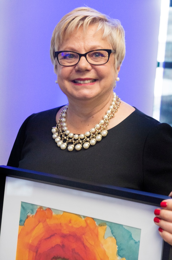 (Rick Egan  |  The Salt Lake Tribune)     Dianne James, chief human resources officer, Zions Bancorporation, received an award for her leadership, at the 2018 Sundance Film Festival Utah Women’s Leadership Celebration in Park City on Thursday, Jan. 25, 2018.
