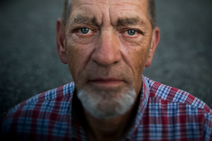 (Jae C. Hong | The Associated Press) Robert Irwin, 72, poses for a photo at Camp Second Chance, a city-sanctioned homeless encampment, Tuesday, Sept. 26, 2017, in Seattle. Irwin said he is planning a trip to Michigan to see his older sister. "I have my own SUV, Chevy Trailblazer. I want to go in March. It will be my last trip."