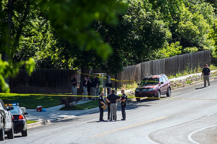 Chris Detrick | The Salt Lake Tribune
Police officers investigate the scene of a shooting Tuesday, June 6, 2017. The shooting occurred at about 3:45 p.m. outside of a residence at about 2175 East and Alta Canyon Drive (about 8630 South), said Sandy police Sgt. Jason Nielsen. Nielsen said the shooter was among the dead and, therefore, there is no threat to the public.
