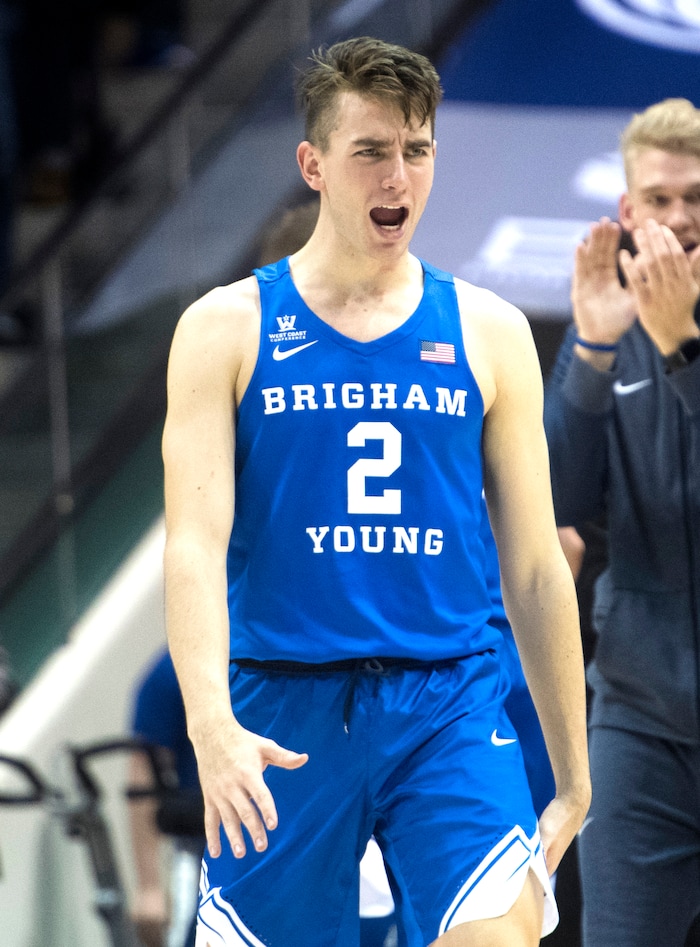 (Rick Egan  |  The Salt Lake Tribune)   Brigham Young Cougars guard Zac Seljaas (2) reacts as BYU extends their lead late in the second half, as the Cougars defeated the Utah Utes 77-65, in basketball action Utah Utes vs. Brigham Young Cougars at the Marriott Center in Provo, Saturday, December 15, 2017.


