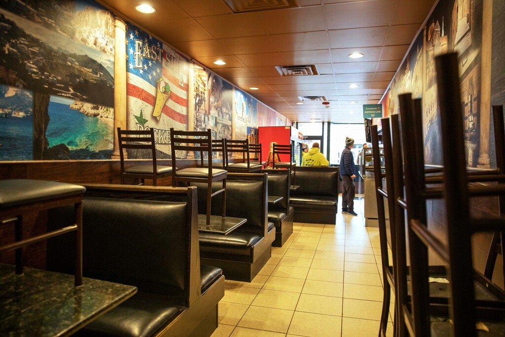 (David Goldman  |  AP file photo) The dining section is closed off at East Side Pockets, a small restaurant near Brown University, in Providence, R.I., on March 25, 2020.