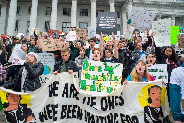 (Rick Egan  |  The Salt Lake Tribune)      
Ocea Wraye joins hundreds of students from around the state chant and sing at the Utah State Capitol Building, demanding action on the climate crisis. Friday, Sept. 20, 2019.