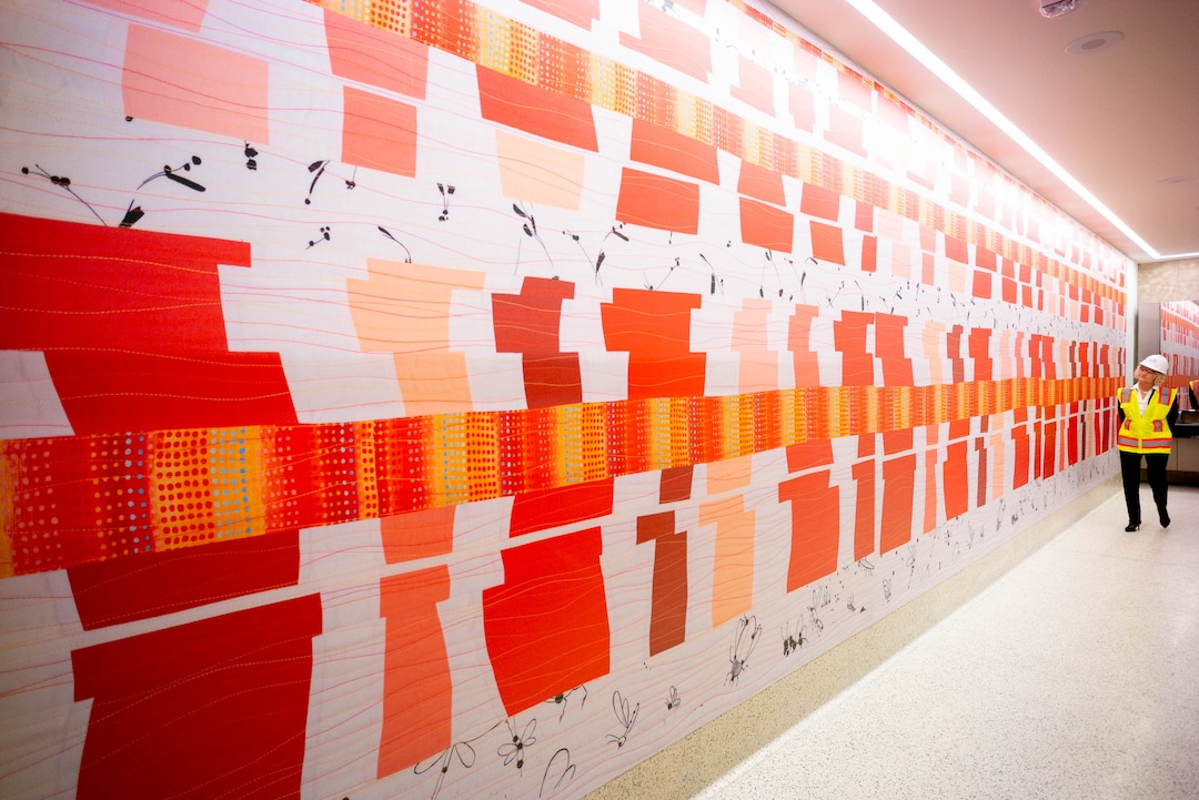 (Trent Nelson  |  The Salt Lake Tribune)
Salt Lake City Mayor Jackie Biskupski looks over Nancy Bardach's piece "Accelerating Decelerating" after a news conference showcasing the art by 18 local and national artists chosen to be featured in the new Salt Lake City airport as the Whimsy Wall Art Project, on Friday, Nov. 1, 2019.