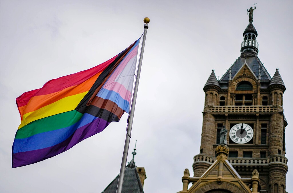 (Francisco Kjolseth | The Salt Lake Tribune) A pride flag is raised at Washington Square, marking the beginning of Pride Month on Thursday, June 1, 2023. Salt Lake City police are investigating a series of pride flag thefts in the Ballpark neighborhood that happened at about 1 a.m. on Monday, Dec. 4, 2023.