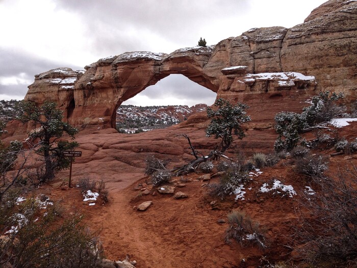 (Erin Alberty  |  The Salt Lake Tribune) 

Snow rests on rocky ledges surrounding Broken Arch on Nov. 29, 2015 at Arches National Park.