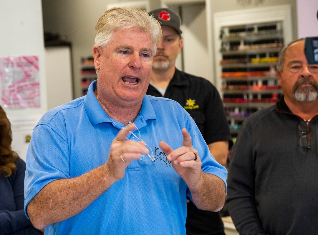 (Rick Egan  |  The Salt Lake Tribune)    Surrounded by other small business owners, Doug Jardine owner of Color My Nails Salon, talks about the impact COVID-19 is having on small businesses, during. news conference at his salon in Midvale, Wednesday, March 25, 2020.