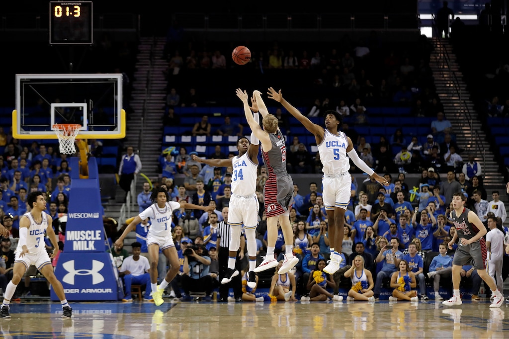 (Marcio Jose Sanchez | The Associated Press) Utah guard Parker Van Dyke (5) makes a winning three-point basket over UCLA guard Chris Smith (5) and guard David Singleton (34) as time expires during the second half of an NCAA college basketball game Saturday, Feb. 9, 2019, in Los Angeles.