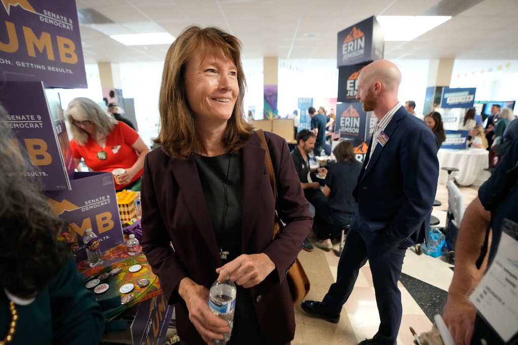 (Francisco Kjolseth | The Salt Lake Tribune) Kathleen Riebe talks with delegates at the Salt Lake County Democratic Party's convention at Highland High School on Saturday, April 11, 2026.
