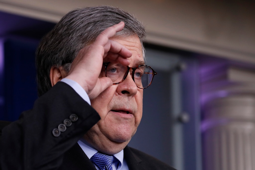 Attorney General William Barr adjusts his glasses as he speaks about the coronavirus in the James Brady Press Briefing Room of the White House, Wednesday, April 1, 2020, in Washington. (AP Photo/Alex Brandon)
