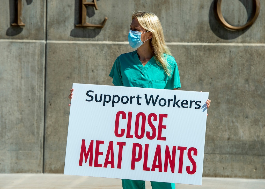(Rick Egan  |  The Salt Lake Tribune) Niki Davis joins a protest at the state Capitol as the Physicians Committee for Responsible Medicine is asking Gov. Gary Herbert to close meatpacking plants in the state to slow the spread of the coronavirus, Thursday, July 30, 2020.