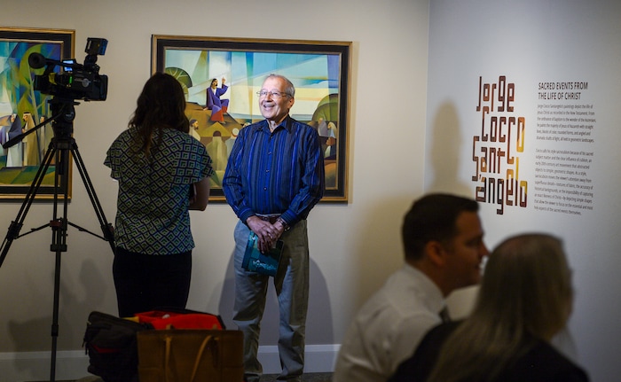 (Leah Hogsten | The Salt Lake Tribune) Jorge Cocco Santángelo is interviewed during the opening of his show "Sacred Events from the Life of Christ." The Church of Jesus Christ of Latter-day Saints Church History Museum presented two new art exhibits, Thursday, May 17, 2018. Paintings created by Argentine artist Jorge Cocco Santángelo and large-scale images taken by LDS Church staff photographers Cody Bell and Leslie Nilsson will be on display beginning May 17 through Oct. 9, 2018, and January 2019, respectively.