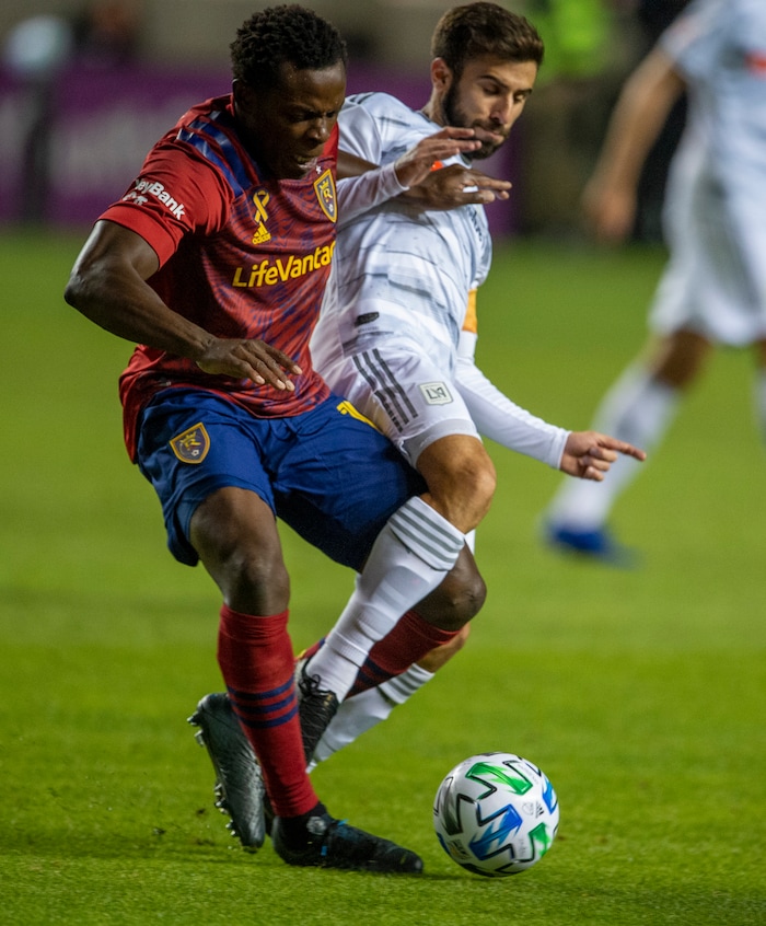 (Rick Egan  |  The Salt Lake Tribune). Real Salt Lake defender Nedum Onuoha (14) goes for the ball along with Los Angeles FC forward Diego Rossi (9), in MLS soccer action between Real Salt Lake and Los Angeles FC at Rio Tinto Stadium, on Wednesday, Sept. 9, 2020.


