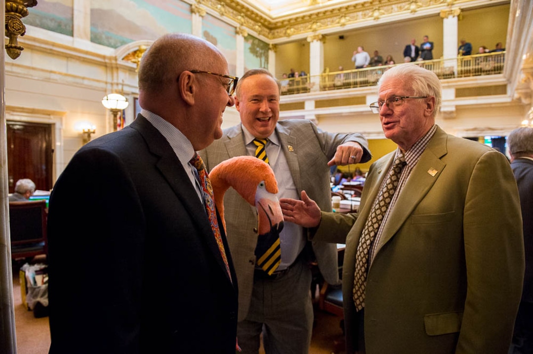(Trent Nelson | The Salt Lake Tribune)  Lobbyist Spencer Stokes with his pink flamingo (the Flamingo Forum) and Sen. Jim Dabakis, D-Salt Lake City, and Sen. Don Ipson, R-St. George, in the Senate Chamber  in Salt Lake City, Thursday March 8, 2018.