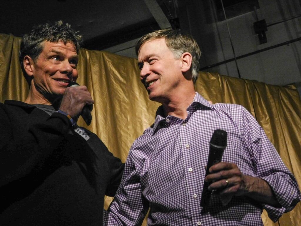 (Erin Alberty | The Salt Lake Tribune) Colorado Gov. John Hickenlooper stands alongside John Sterling, director of The Conservation Alliance, in a party Wednesday night at the McNichols Civic Center to welcome the Outdoor Retailer show to Denver. Organizers of the massive trade show ended its 20-year run in Utah in 2017 following disputes with state leaders over public lands policy.