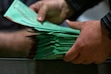 FILE — Mail-in ballots are processed at the Maricopa County Tabulation and Election Center in Phoenix, Ariz., Nov. 8, 2022. As the Supreme Court weighs the legality of a Trump administration plan to change mail-in balloting, a second lower court judge ruled overnight on Sunday, Sept. 13, 2026, that the plan is likely illegal and should be blocked before the November election. (Alisha Jucevic/The New York Times)