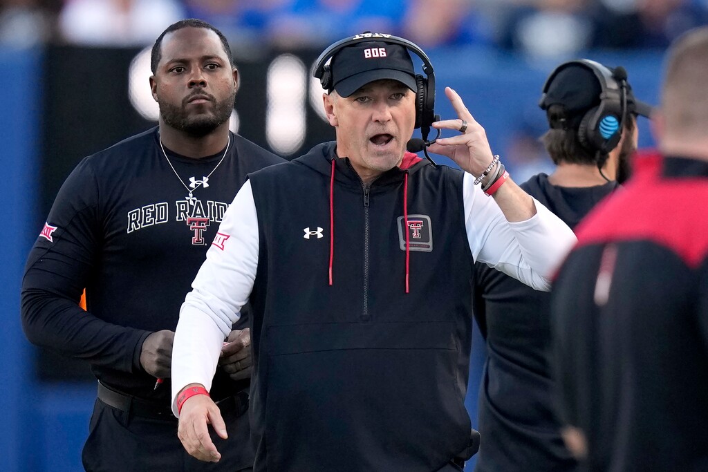 (Rick Bowmer | AP) Texas Tech head coach Joey McGuire looks on during the first half of an NCAA college football game against BYU Saturday, Oct. 21, 2023, in Provo, Utah.