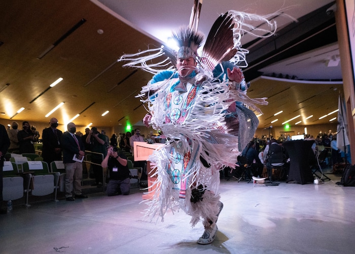(Francisco Kjolseth | The Salt Lake Tribune) Christian Parrish Takes the Gun, known professionally as Supaman, performs a fancy dance for the start of the 15th Annual Governor’s Native American Summit held on the Utah Valley University campus on Friday, Aug. 6, 2021.