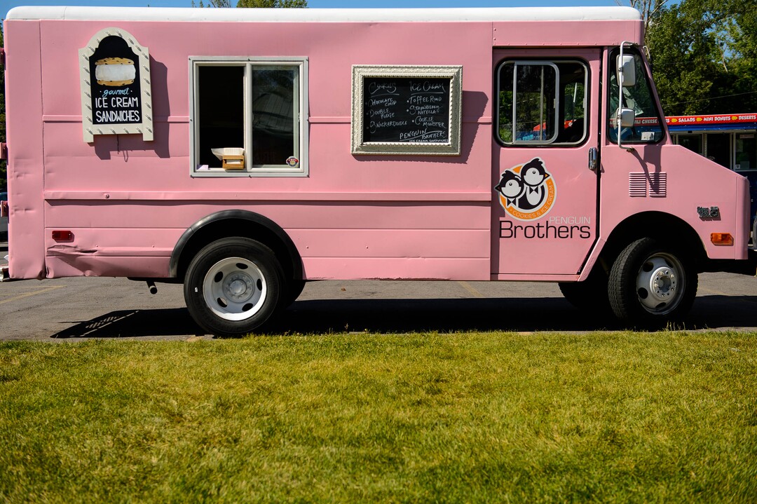 (Trent Nelson  |  The Salt Lake Tribune)
The Penguin Brothers food truck serves ice cream sandwiches in Salt Lake City on Friday June 14, 2019.