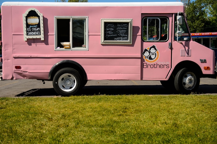 (Trent Nelson | The Salt Lake Tribune)
The Penguin Brothers food truck serves ice cream sandwiches in Salt Lake City on Friday June 14, 2019.